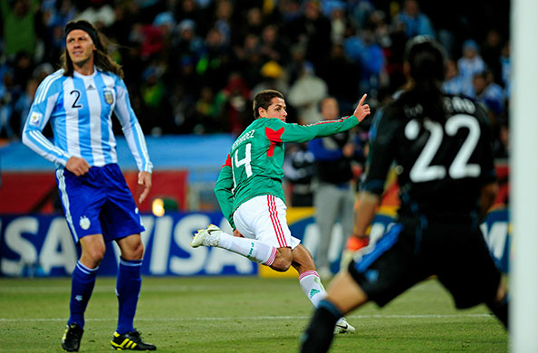 argentina v mexico: Javier Hernandez celebrates pulling a goal back for Mexico