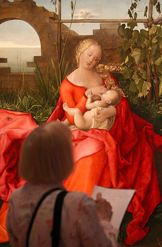 Fakes National Gallery: A visitor views The Madonna with the Iris, originally attributed to Durer