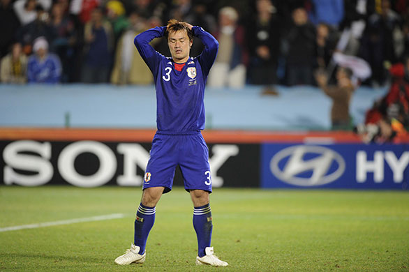 Paraguay v Japan: A devastated Yuichi Komano after his penalty miss