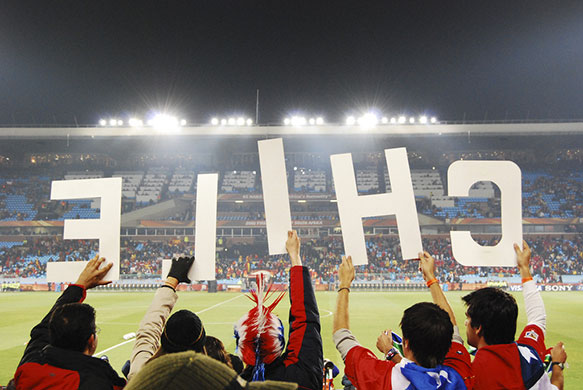 fans' network: Chile fans hold up big letters spelling out their team's name