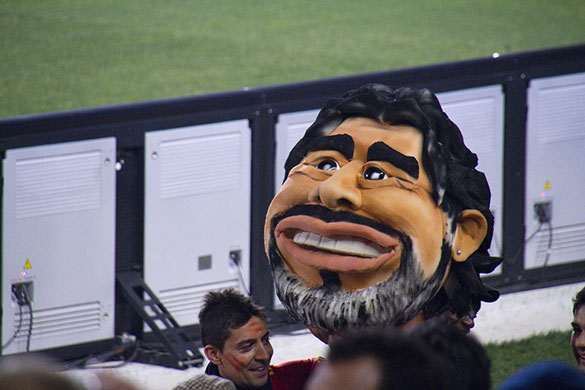 A giant Maradona puppet head