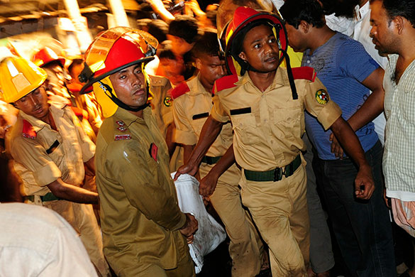 Dhaka fire: Firefighters carried out victims from burnt houses