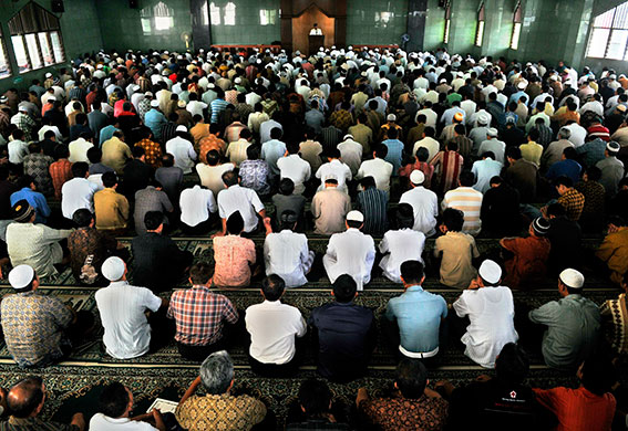 24 Hours: Indonesian Muslims listen to a sermon during a Friday prayer in Jakarta
