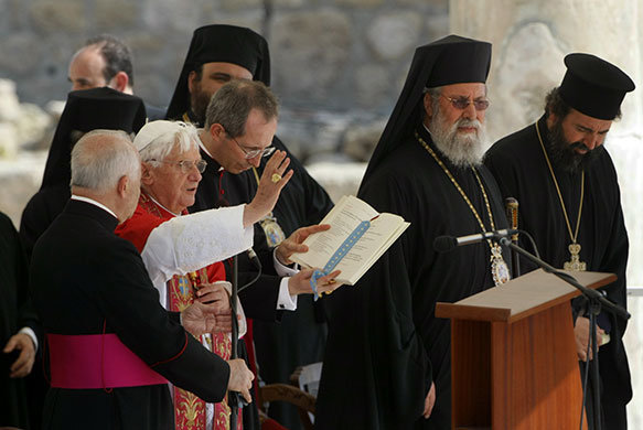 Pope in Cyprus: Pope Benedict XVI prays at the church of Agia Kyriaki Chrysopolitissa