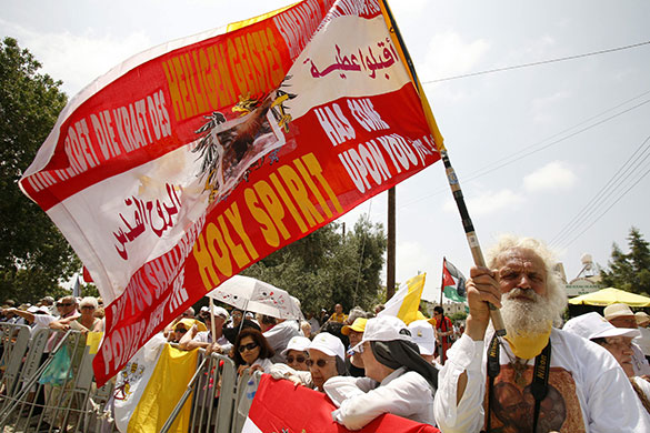 Pope in Cyprus: Onlookers gather outside the church of Agia Kyriaki Chrysopolitissa