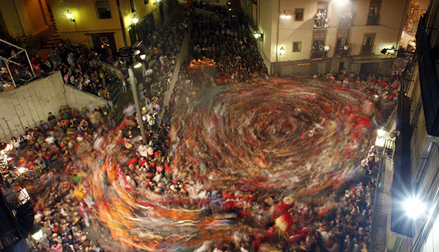 24 hours in pictures: Berga city, Spain: Revellers take part in the  La Patum festival