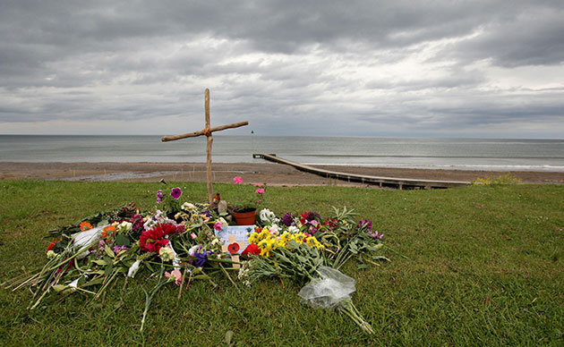 Cumbria memorial: Floral tributes on a make-shift memorial on Seascale beach car park