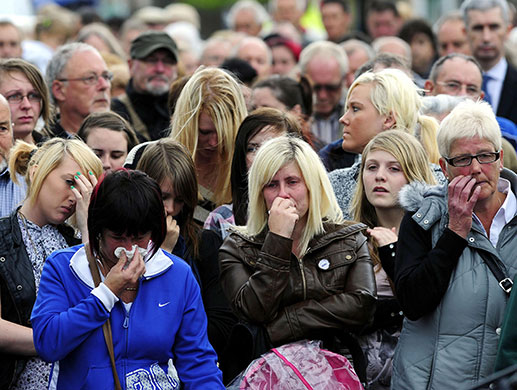 Cumbria memorial: Residents of the Egremont area gather during a memorial service