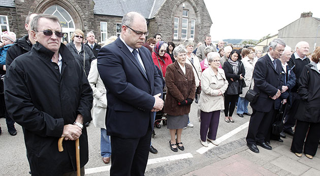 Cumbria memorial services: Members of the public during a memorial service at Frizington