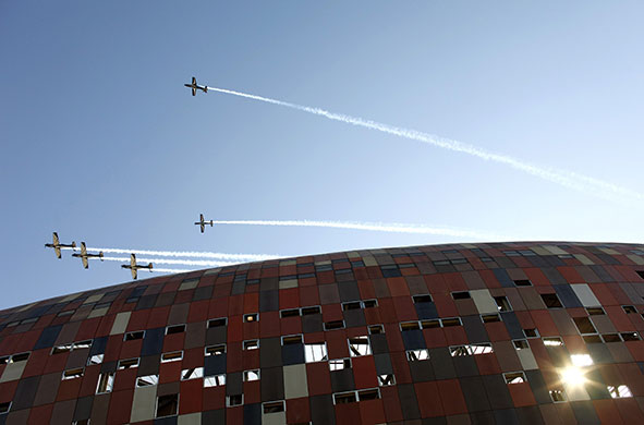 World Cup parade: Airforce silver falcons fly past the Soccer City stadium in Johannesburg