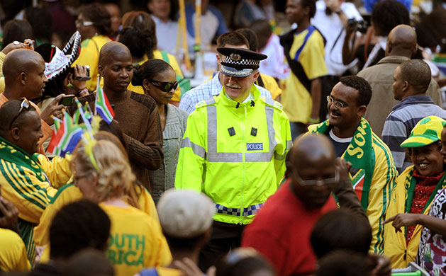Johannesburg parade: Assistant Chief Constable Andy Holt meets fans