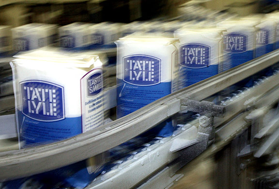 Tate & Lyle: 2008: Packs of Tate & Lyle granulated sugar pass along the production line