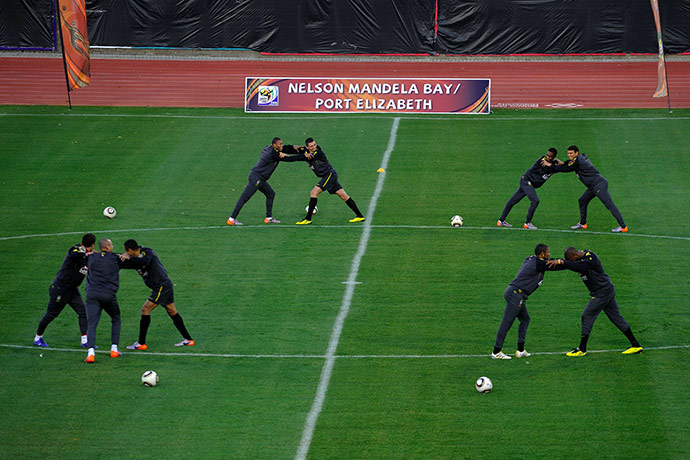 world cup: Brazil's football players stretch during