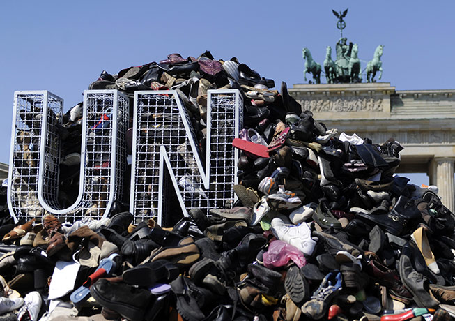 24 Hours: 16,000 shoes for 'The Pillar of Shame' at Brandenburg Gate in Berlin