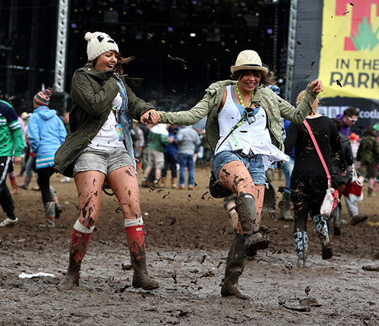 T in the Park: Revellers enjoying the muddy conditions