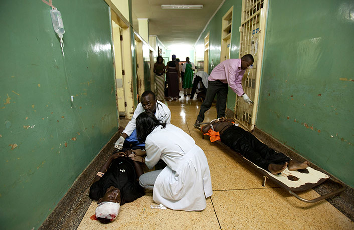 Uganda explosion: Paramedics attend the injured of an explosion, at Mulago Hospita Uganda