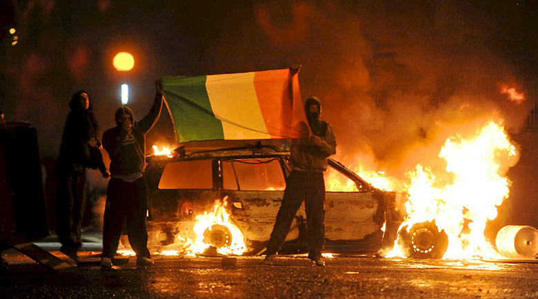Belfast riots: Cars burn during Nationalist rioting in the Ardoyne area of North Belfast