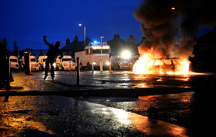 24 hours pictures: Cars burn during Nationalist rioting, Belfast