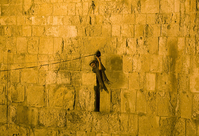 24 hours pictures: A right-wing Israeli activist stands in the walls of Jerusalem's Old City