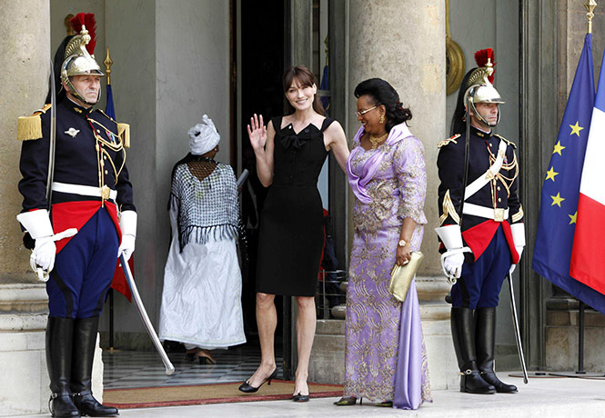 Bastille Day: Carla Bruni-Sarkozy and Lobbo Traore Toure