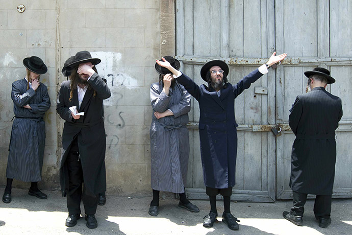 24 hours in pictures: Jewish men protest against the removal of ancient tombs