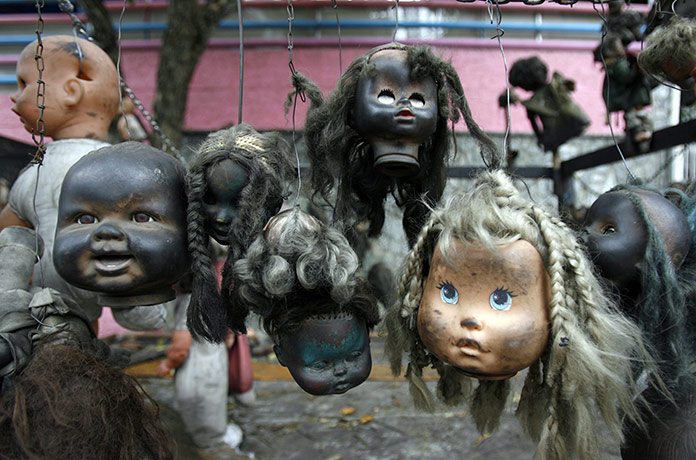 24 hours in pictures: Caracas, Venezuela: Toys hang from a van