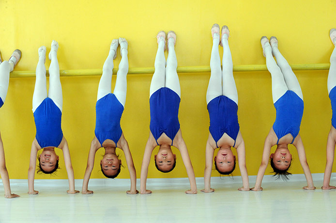 24 hours in pictures: Haozhou, China: Schoolchildren take part in a dance class