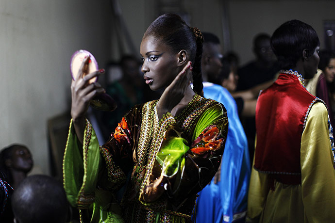 24 hours in pictures: Dakar, Senegal: A model backstage during Dakar Fashion Week