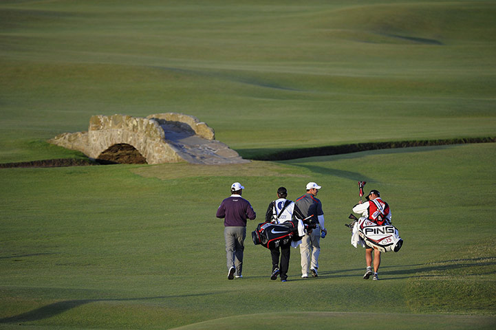Saturday British Open: Lee Westwood & Paul Casey head towards the Swilken Bridge & 18th fairway