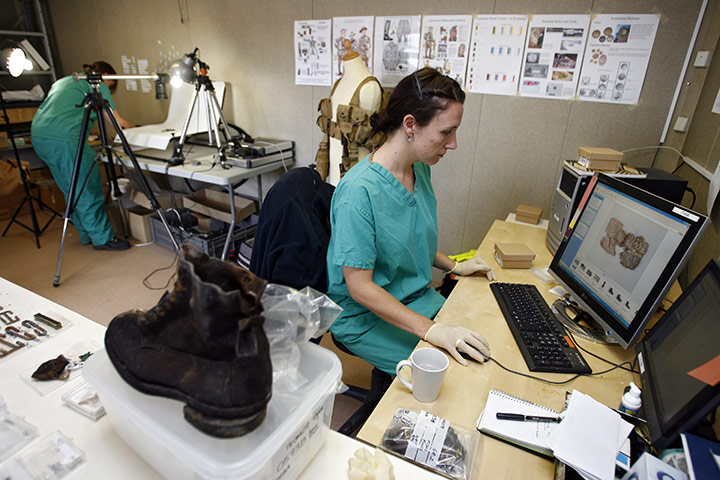 Fromelles: Oxford Archaeology institute recording objects recovered in mass graves