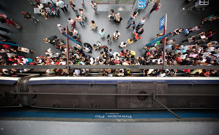 24 hours in pictures: Aerial view of people boarding the metro in Madrid