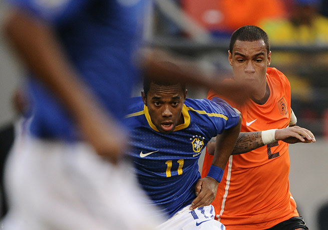 Netherlands versus Brazil: Robinho tussles with Gregory van der Wiel 