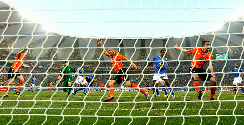 Netherlands versus Brazil: Netherlands players celebrate Melo's own goal