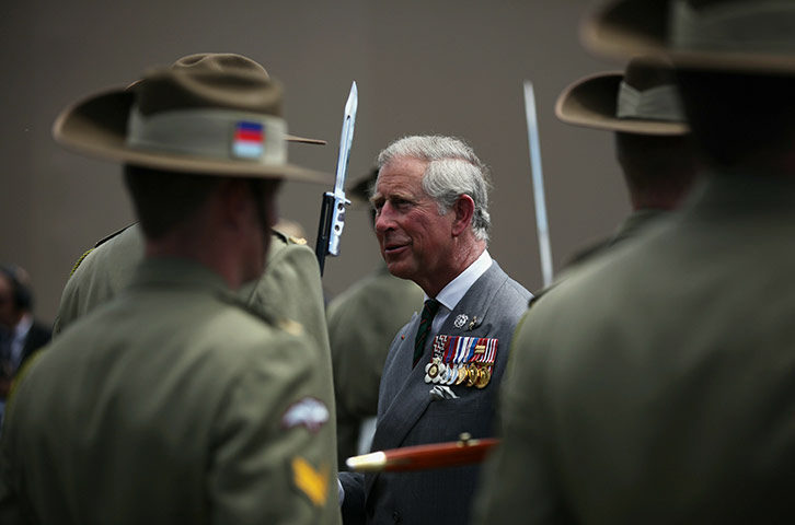 24 hours in pictures: Lille, France: Prince Charles attends the burial of a soldier at Fromelles