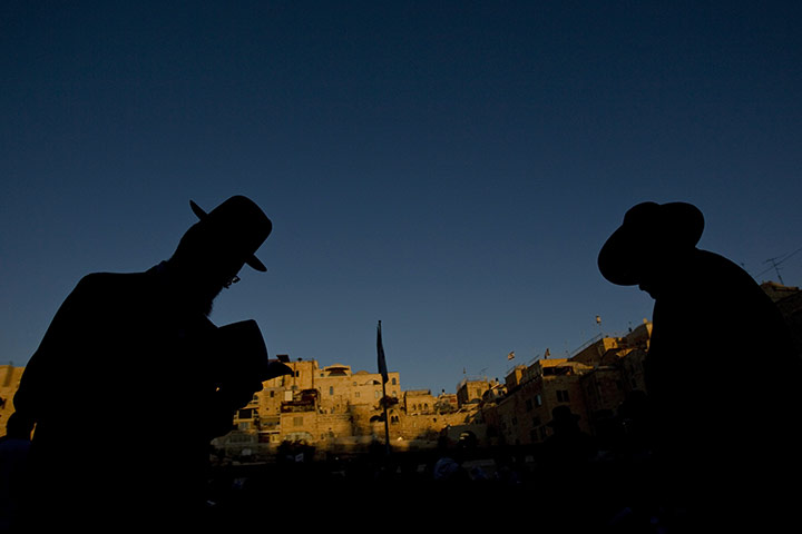 24 hours in pictures: Jerusalem: Ultra-orthodox Jewish men pray
