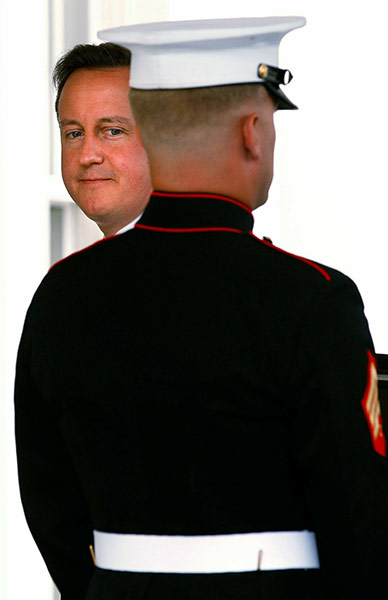 Cameron in Washington: Prime Minister David Cameron arrives at the West Wing of the White House