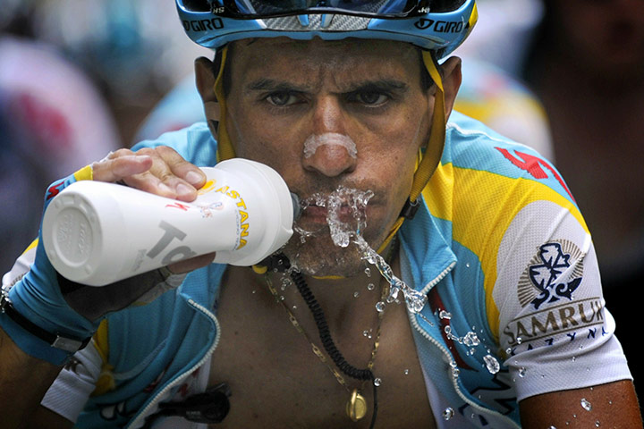 cycling: Italy's Paolo Tiralongo drinks as he rid