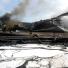 Dalian oil fire in China: Chinese firefighters rest after they ext