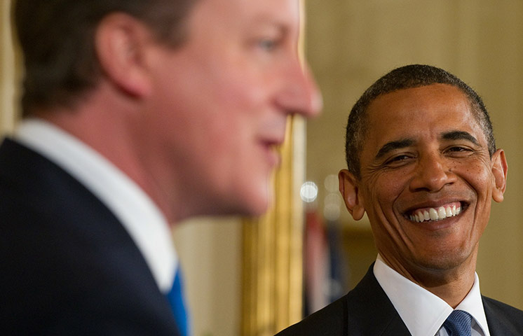Obama and Cameron: US President Barack Obama(R) and British