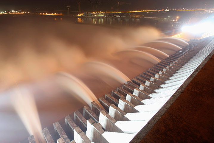 Three gorges dam: The Three Gorges Dam discharges water to lower the level in a reservoir