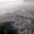 Dalian Oil Spill: leaked oil floating off the coast of Dalian, northeast China