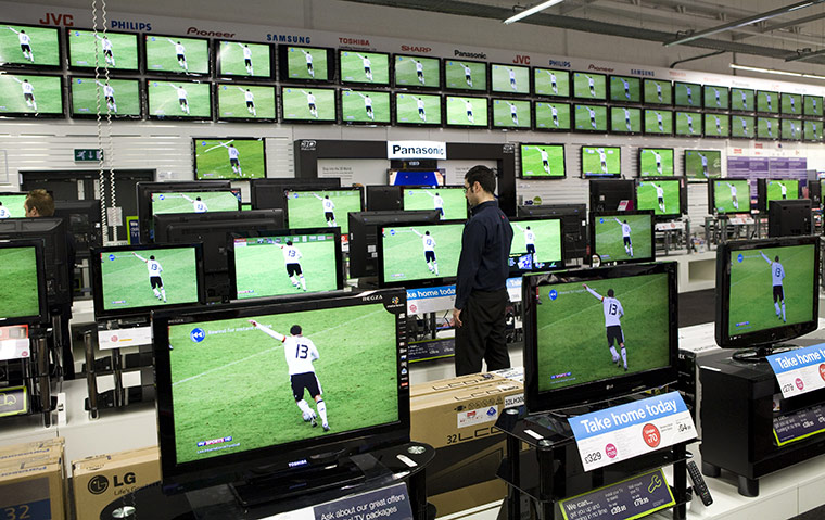 Week in Business: The World Cup on televisions at a Currys store in London