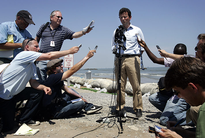 Week in Business: BP CEO Tony Hayward speaks at a press conference on Fourchon Beach