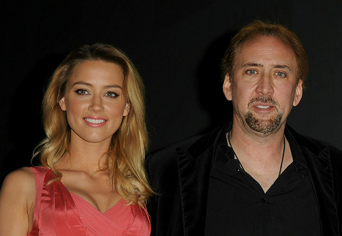 Comic Con: Actress Amber Heard and actor Nicolas Cage at the 'Drive Angry 3D' panel