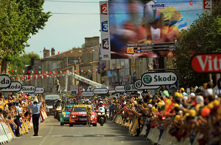 Tour de France time trial: Contador crosses the line