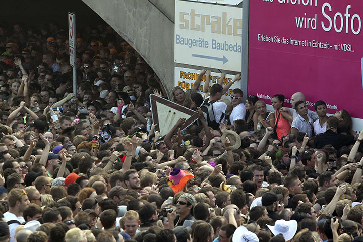 Love Parade: A crowd of people outside a tunnel