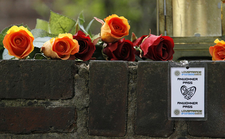 Love Parade: A wall decorated with flowers to commemorate the victims of the stampede