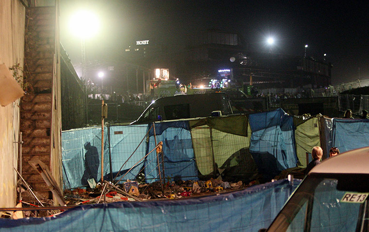 Love Parade: Officers investigate the site near a staircase