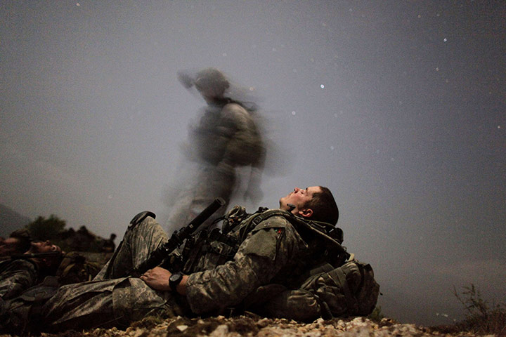 Afghanistan: 12 August 2009: A US soldier takes a break