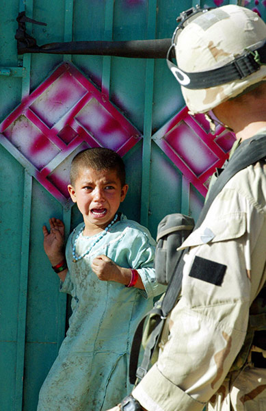 Afghanistan: 19 May 2003: A girl cries in fear